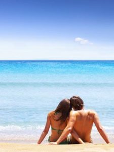 newlyweds on beach