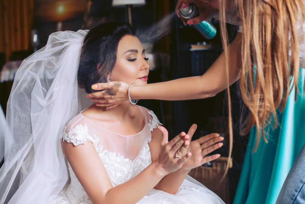 Wedding Day Emergency Kit - Bride Having Her Hair Sprayed